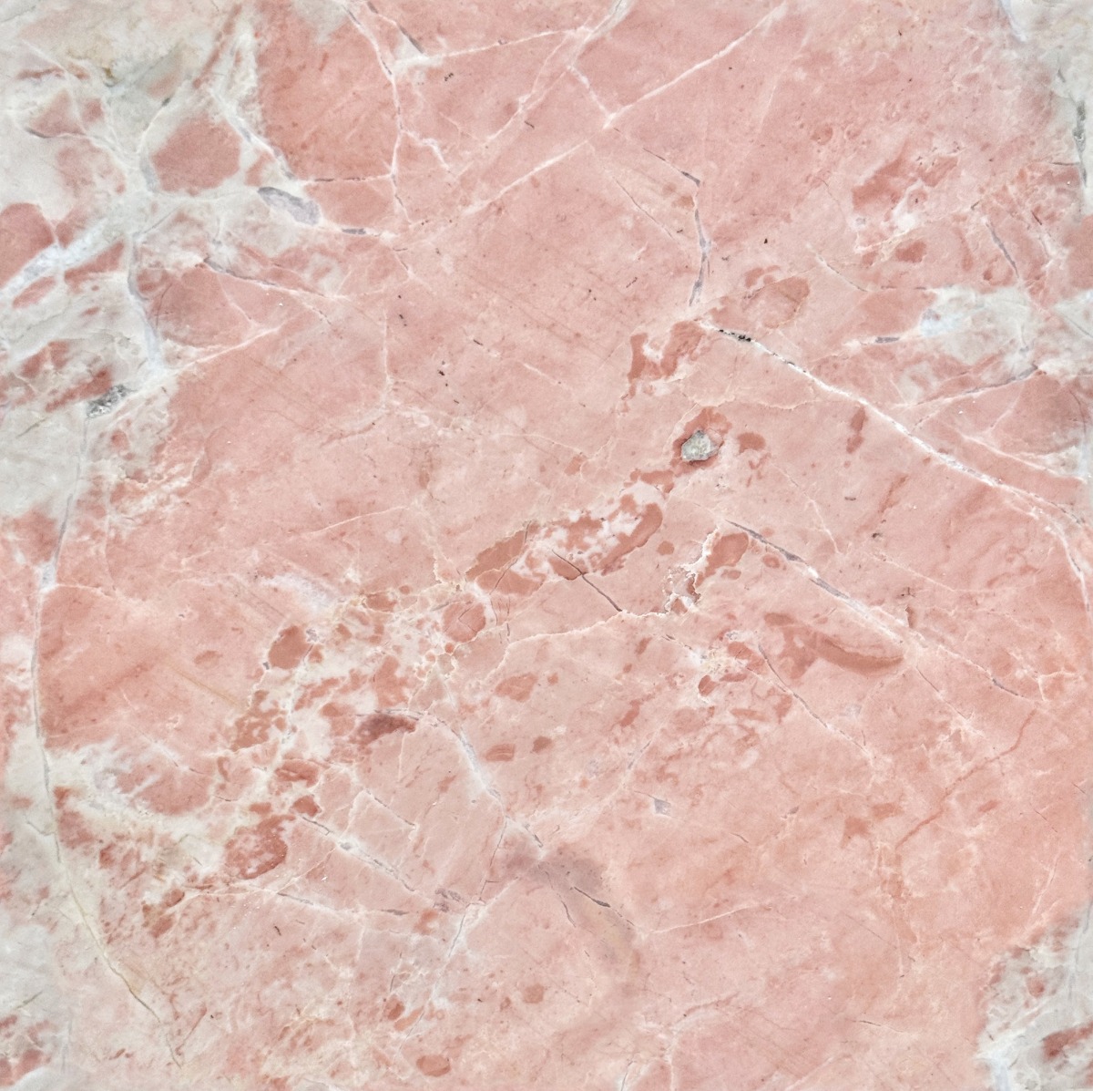 A seamless stone texture with pink marble blocks arranged in a None pattern