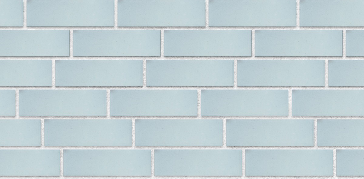 A seamless brick texture with eco-glazed brick slips winter morning  units arranged in a Staggered pattern