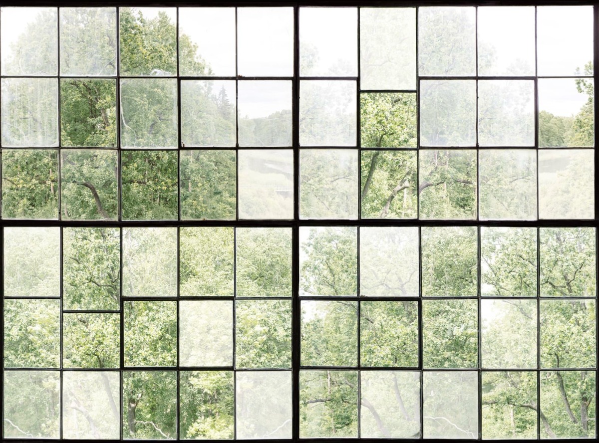 A seamless wallpaper texture with factory window units arranged in a None pattern