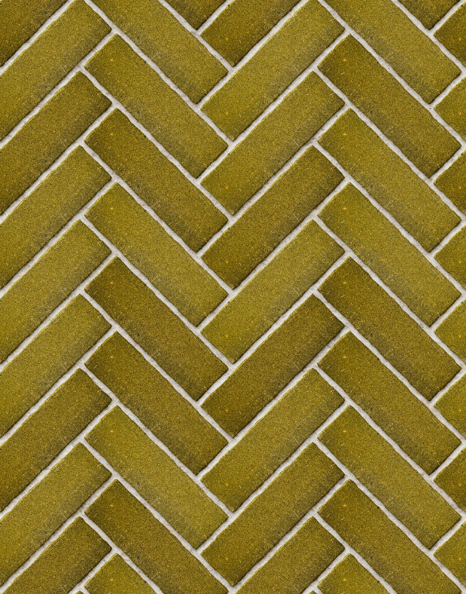 A seamless brick texture with k-briq® heriot mustard units arranged in a Herringbone pattern