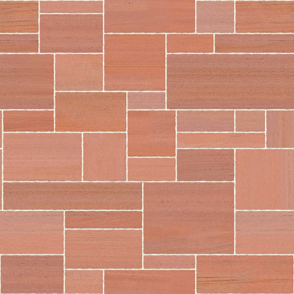 A seamless stone texture with red sandstone blocks arranged in a Uncoursed Ashlar pattern