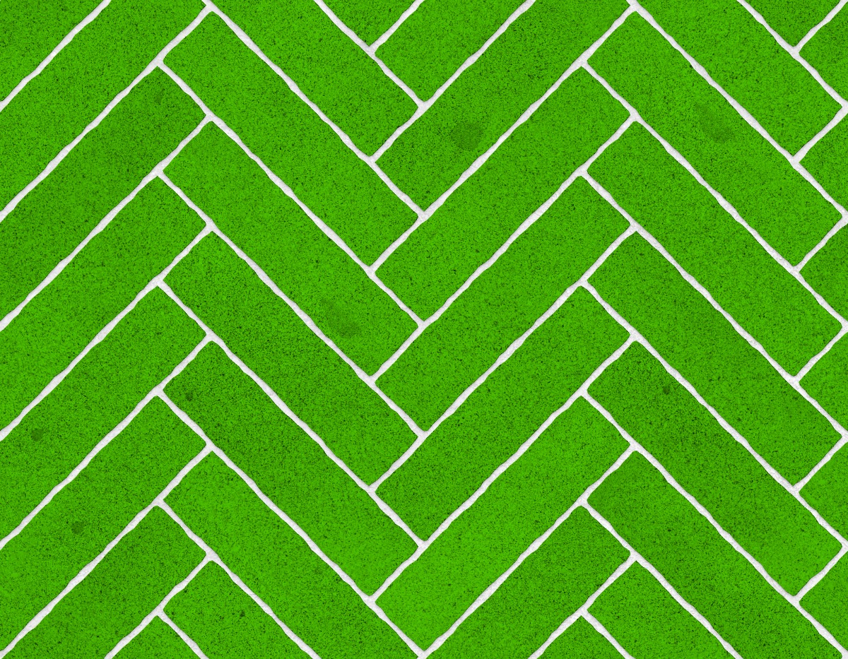 A seamless stone texture with granite blocks arranged in a Herringbone pattern