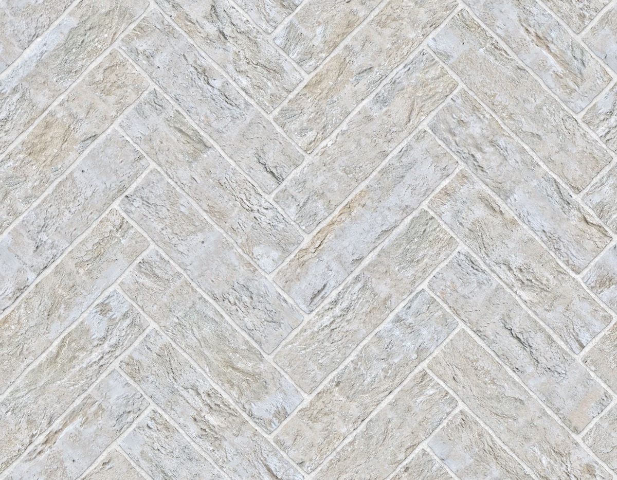 A seamless brick texture with buff units arranged in a Herringbone pattern