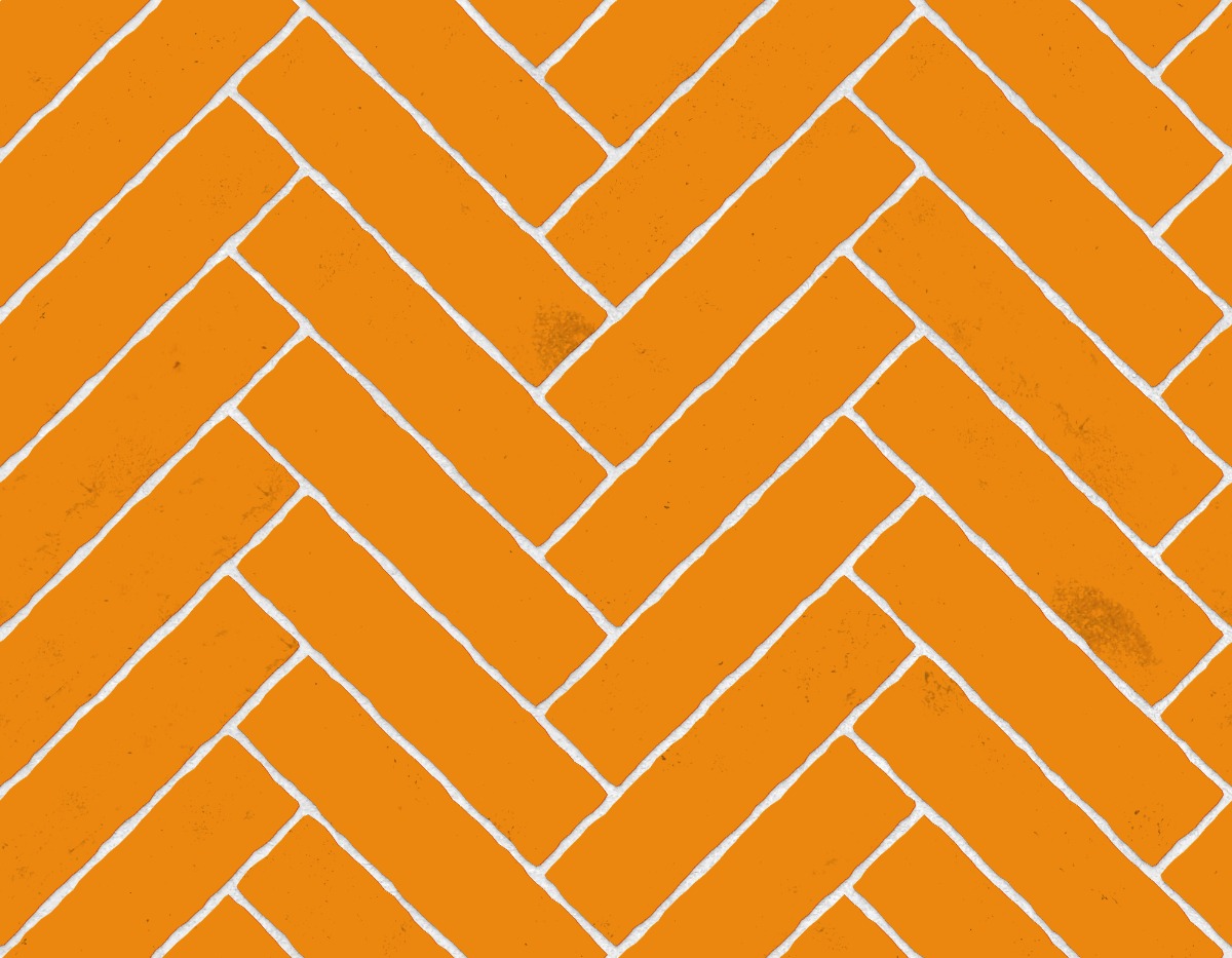 A seamless brick texture with finnish grey brick units arranged in a Stretcher pattern