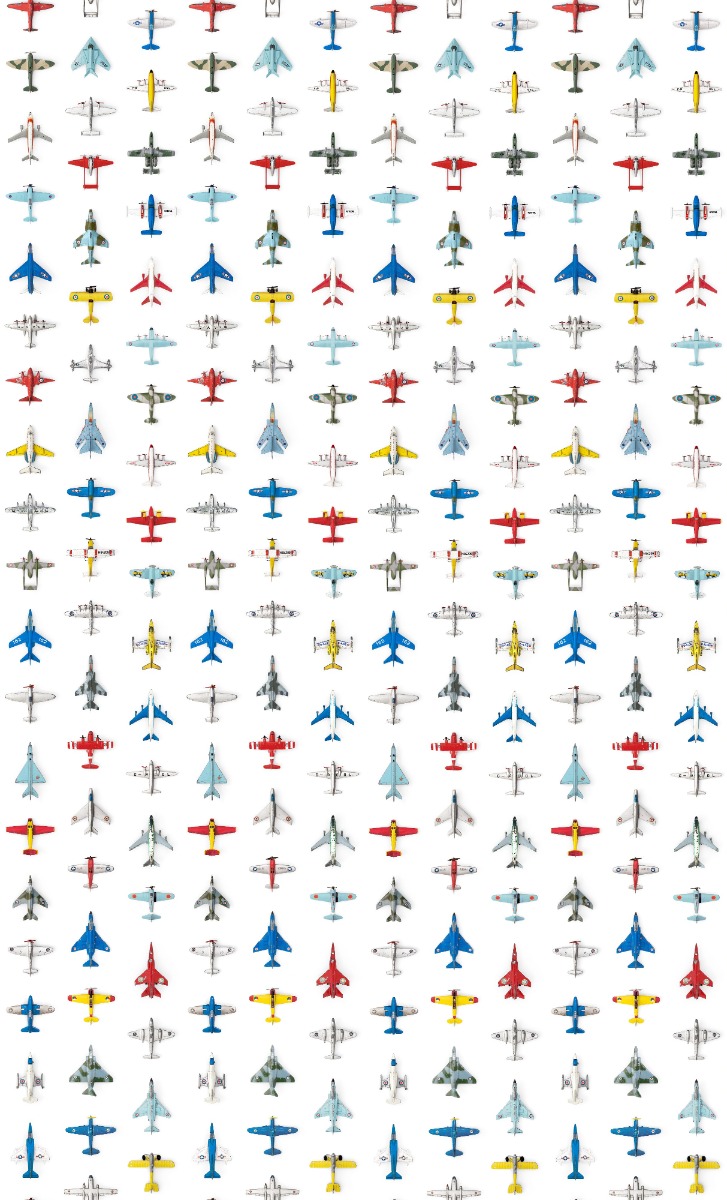 A seamless wallpaper texture with airplanes wallpaper units arranged in a Stack pattern