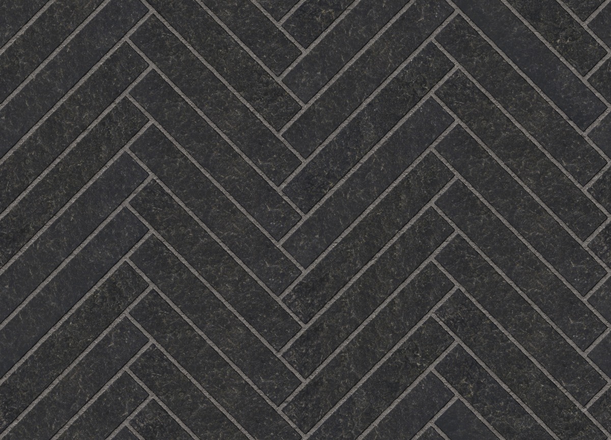 A seamless stone texture with flamed crystal black granite blocks arranged in a Herringbone pattern