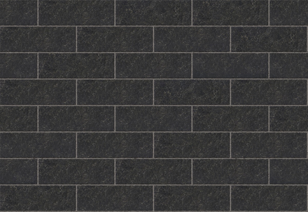 A seamless stone texture with flamed crystal black granite blocks arranged in a Stretcher pattern