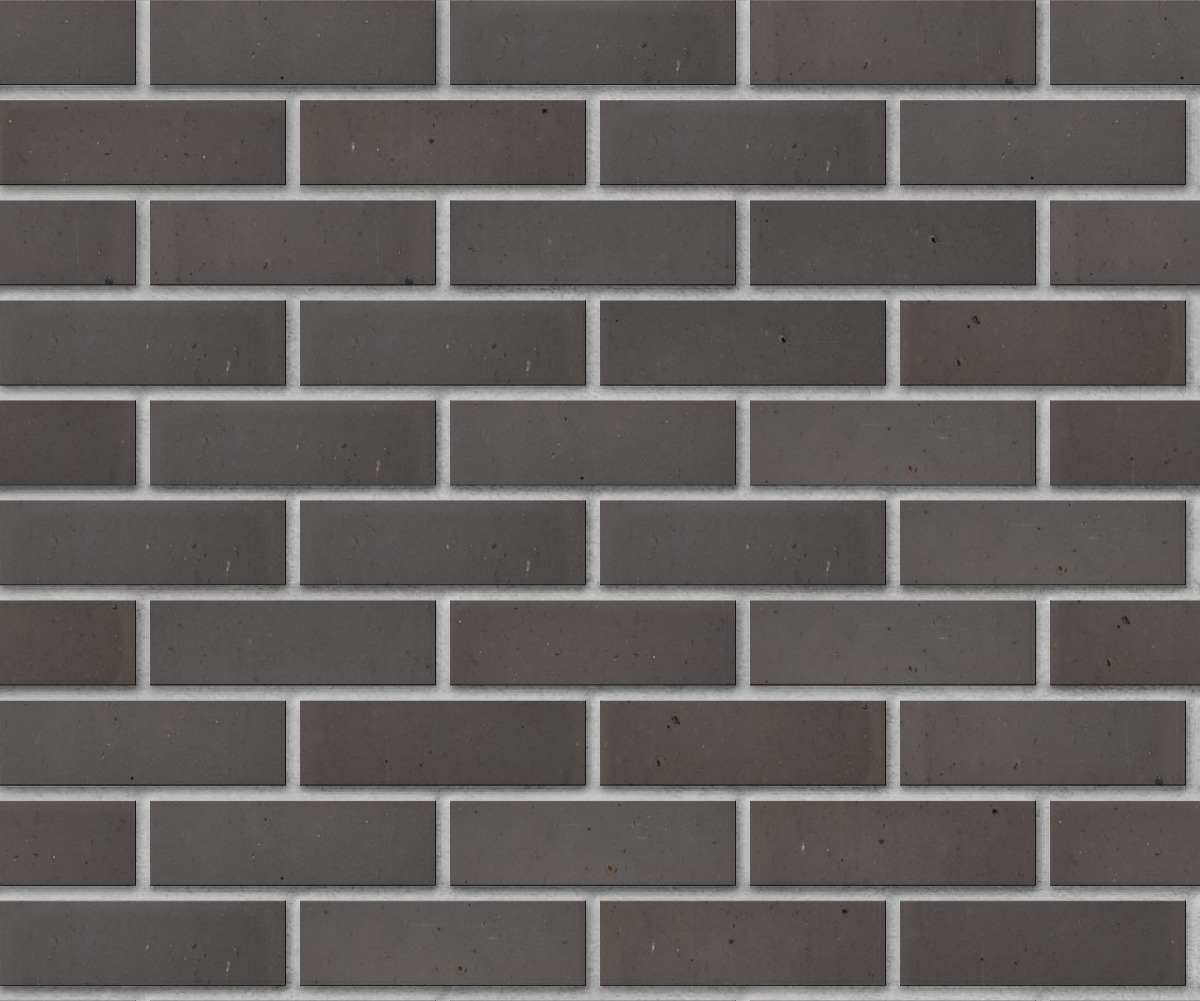 A seamless brick texture with graphite smooth thin brick modular units arranged in a Stretcher pattern