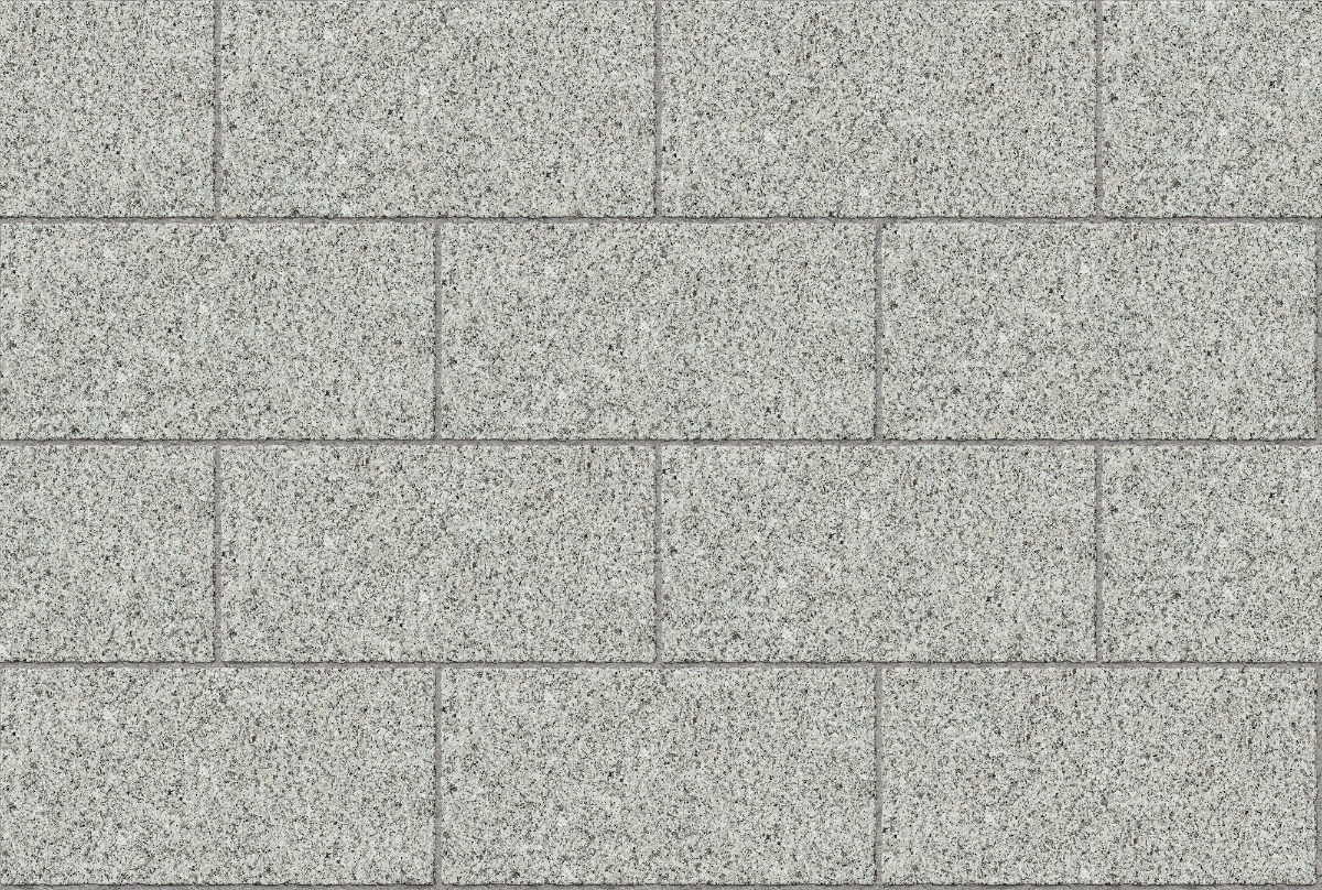 A seamless stone texture with flamed royal white granite blocks arranged in a Stretcher pattern