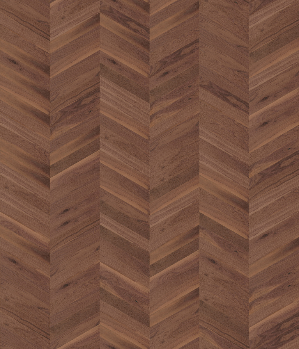 A seamless wood texture with s750_nussbaum__lebhaft-bunt_gef. boards arranged in a Chevron pattern