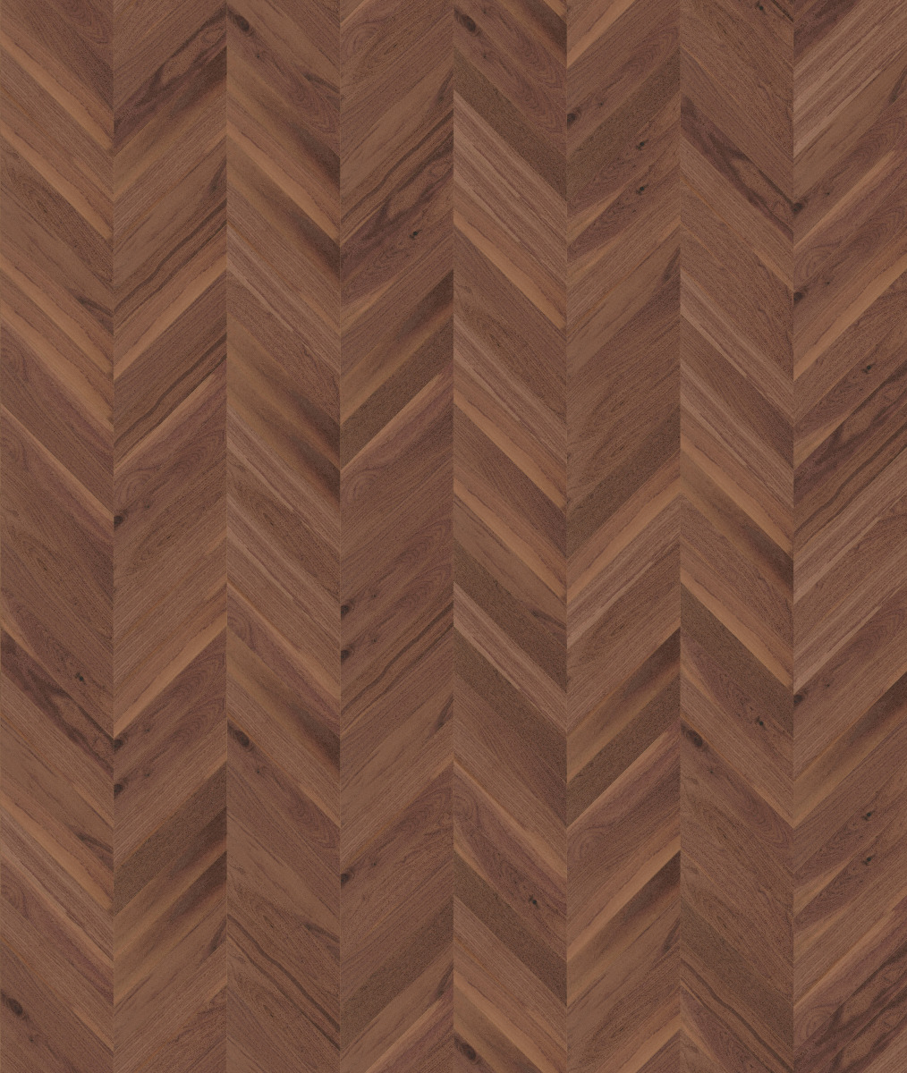 A seamless wood texture with s750_nussbaum__lebhaft-bunt_gef. boards arranged in a Chevron pattern