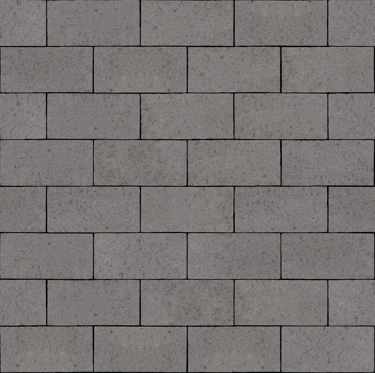 A seamless stone texture with pavestone classic charcoal blocks arranged in a Stretcher pattern