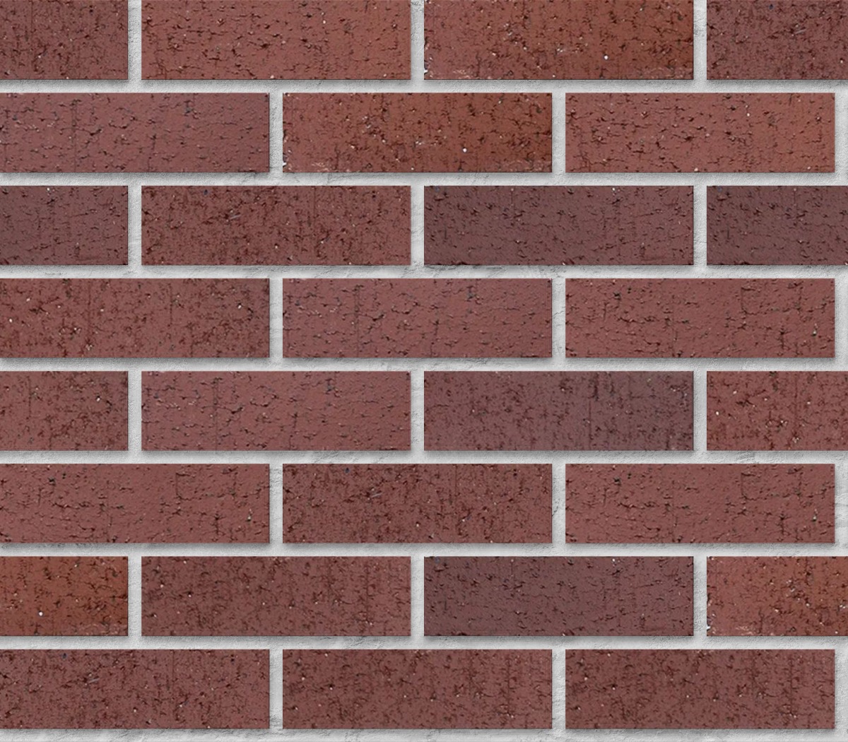 A seamless brick texture with cherry velour units arranged in a Stretcher pattern