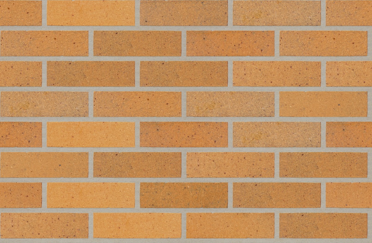 A seamless brick texture with goldenrod ironspot smooth units arranged in a Stretcher pattern
