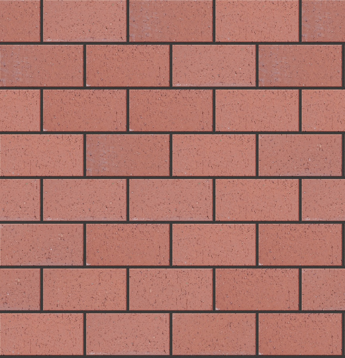 A seamless landscaping texture with regimental red permeable pavers units arranged in a Stretcher pattern
