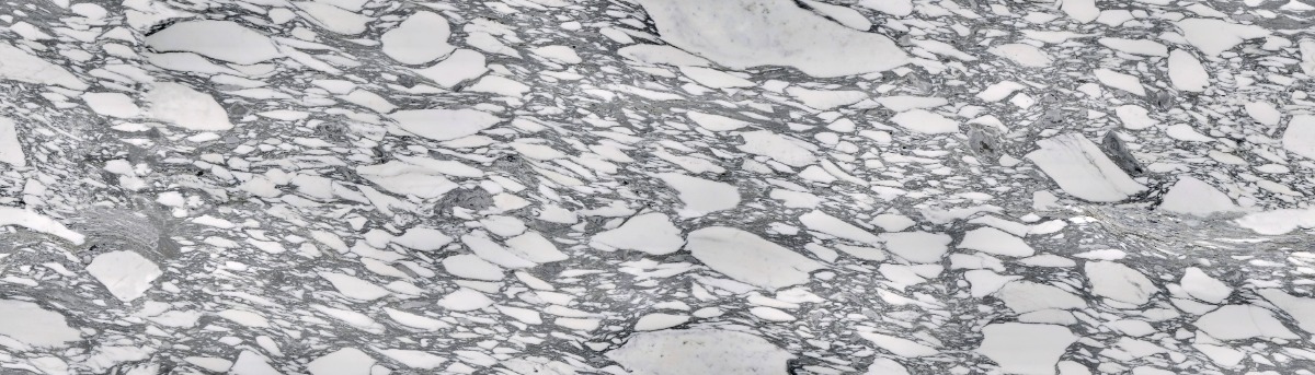 A seamless stone texture with arabescato corchia - marble blocks arranged in a None pattern