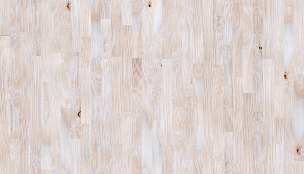 A seamless wood texture with douglas fir boards arranged in a Staggered pattern