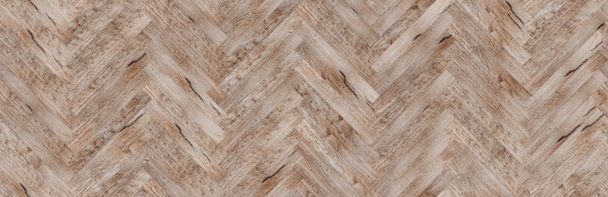 A seamless wood texture with english brown oak boards arranged in a Herringbone pattern