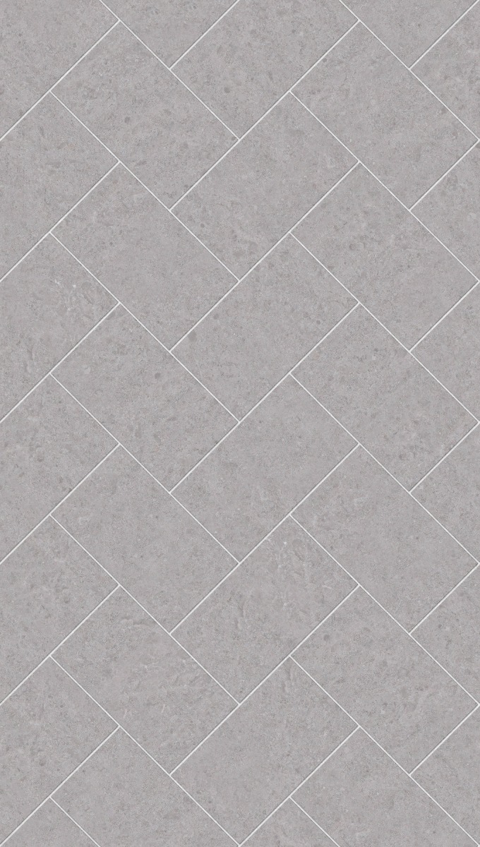 A seamless stone texture with oman white - limestone blocks arranged in a Herringbone pattern