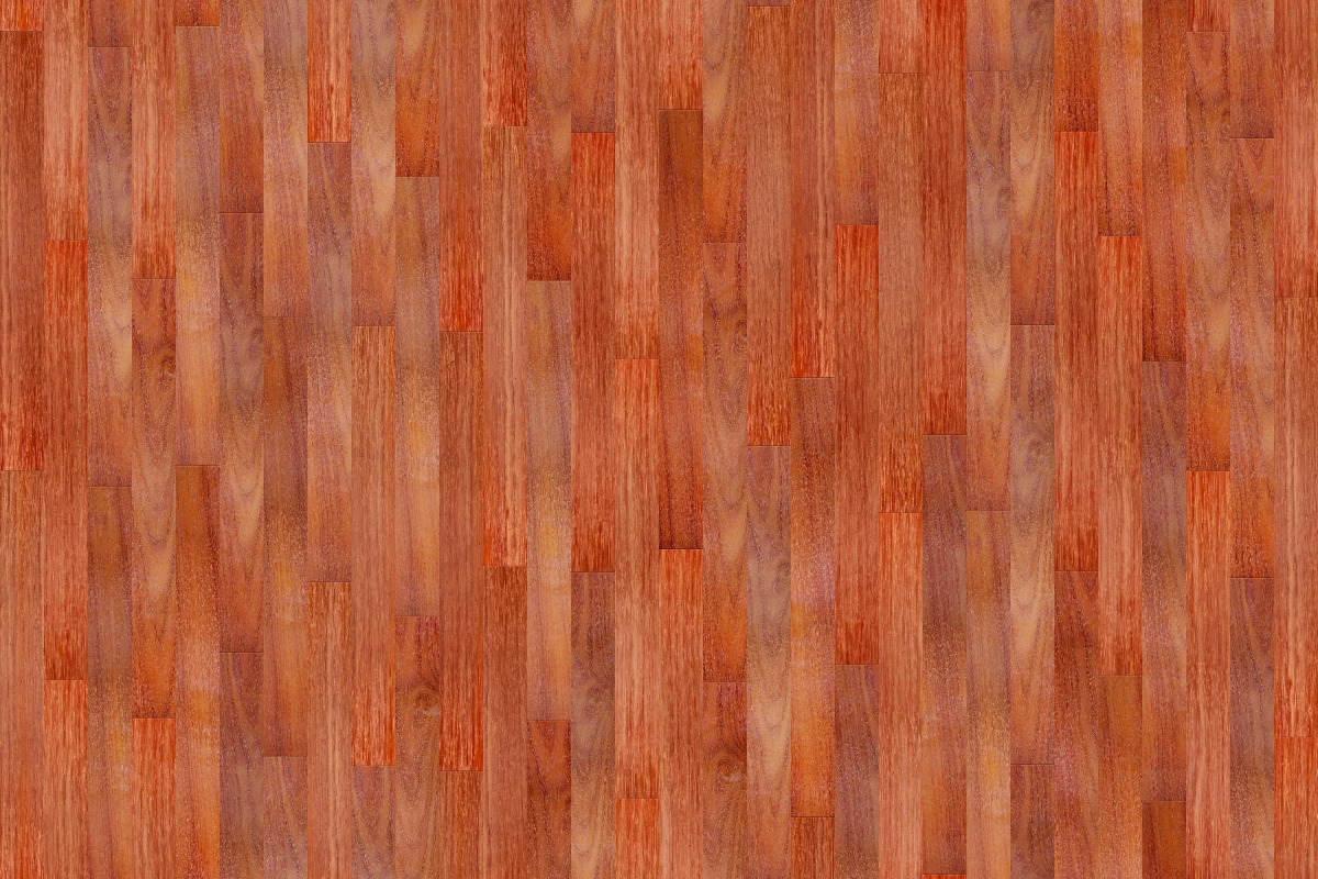 A seamless wood texture with padauk boards arranged in a Staggered pattern