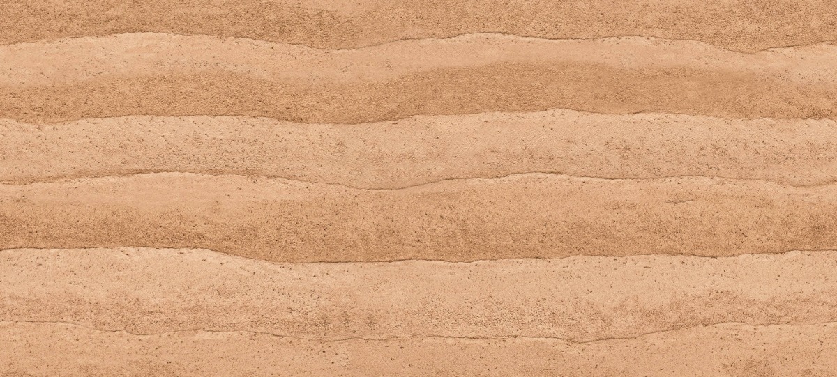 A seamless finishes texture with rammed earth - red clay units arranged in a None pattern