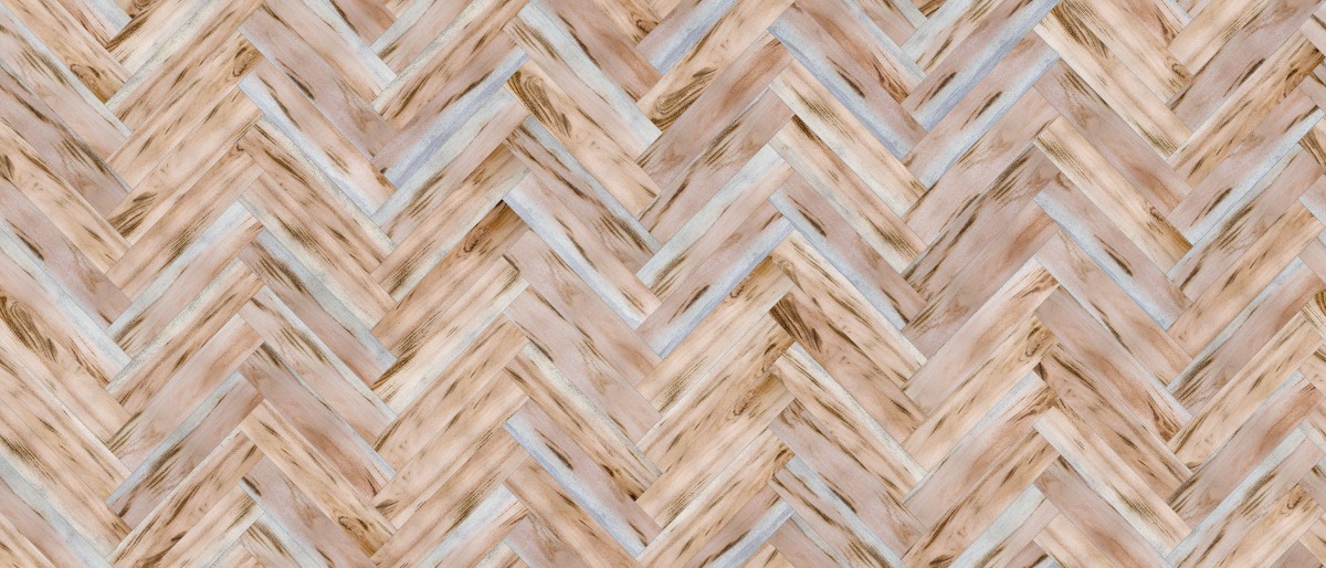 A seamless wood texture with tigerwood - light boards arranged in a Herringbone pattern