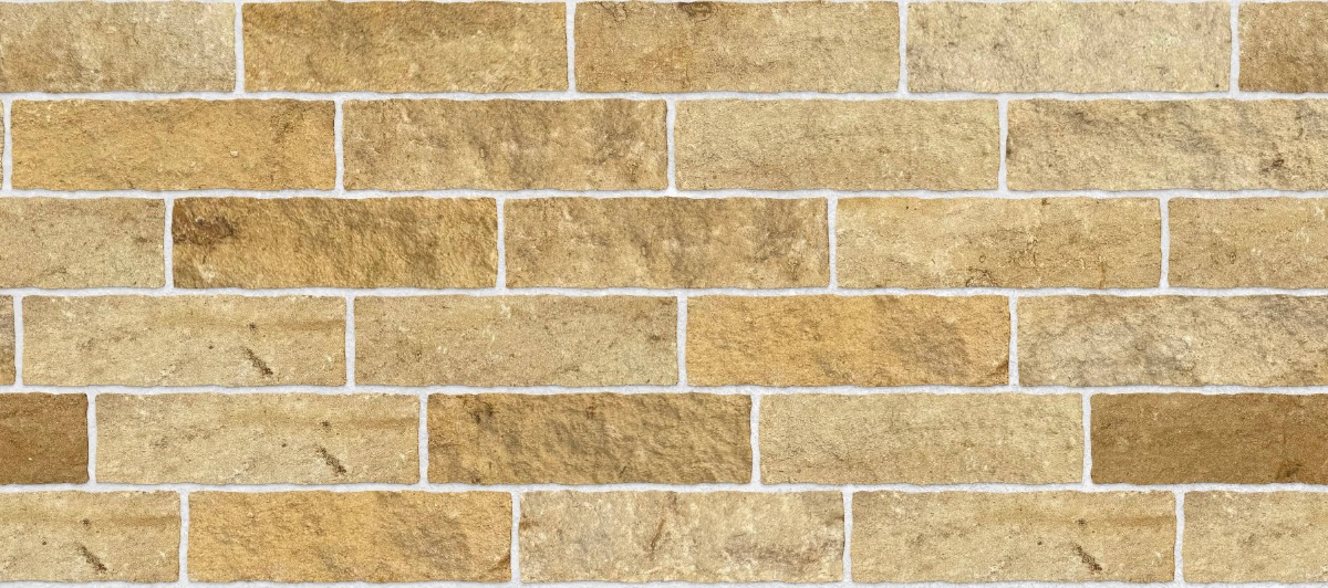 A seamless stone texture with cotswold blend stone cladding blocks arranged in a Staggered pattern