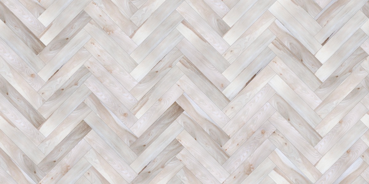 A seamless wood texture with elm - light boards arranged in a Herringbone pattern