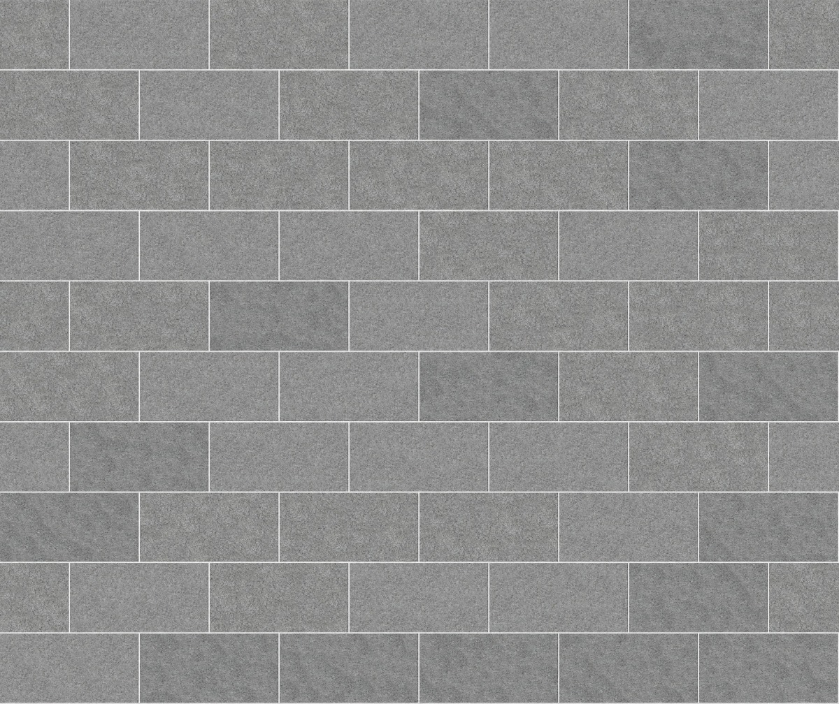 A seamless stone texture with m902 sdm431 superior northern granite - sand blasted blocks arranged in a Stretcher pattern