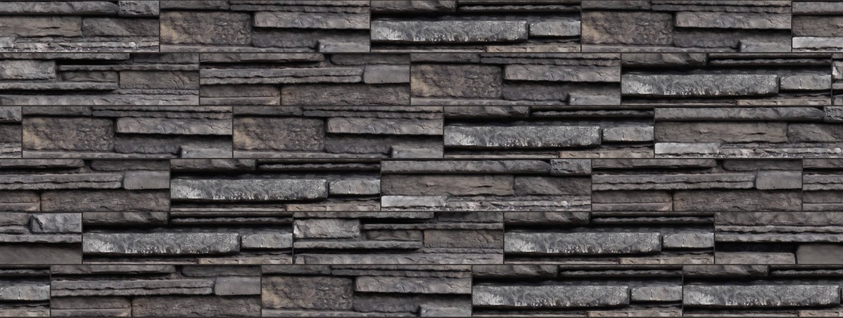 A seamless stone texture with midnightbrook ridgewater ledge blocks arranged in a Staggered pattern