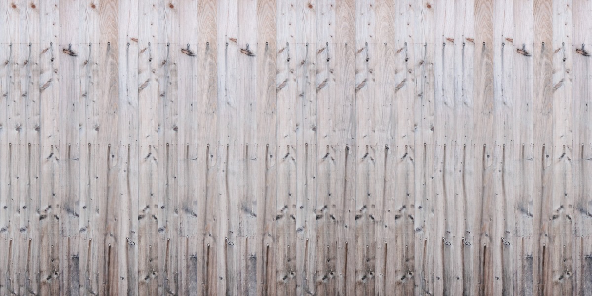 A seamless wood texture with weathered larch cladding boards arranged in a Stack pattern