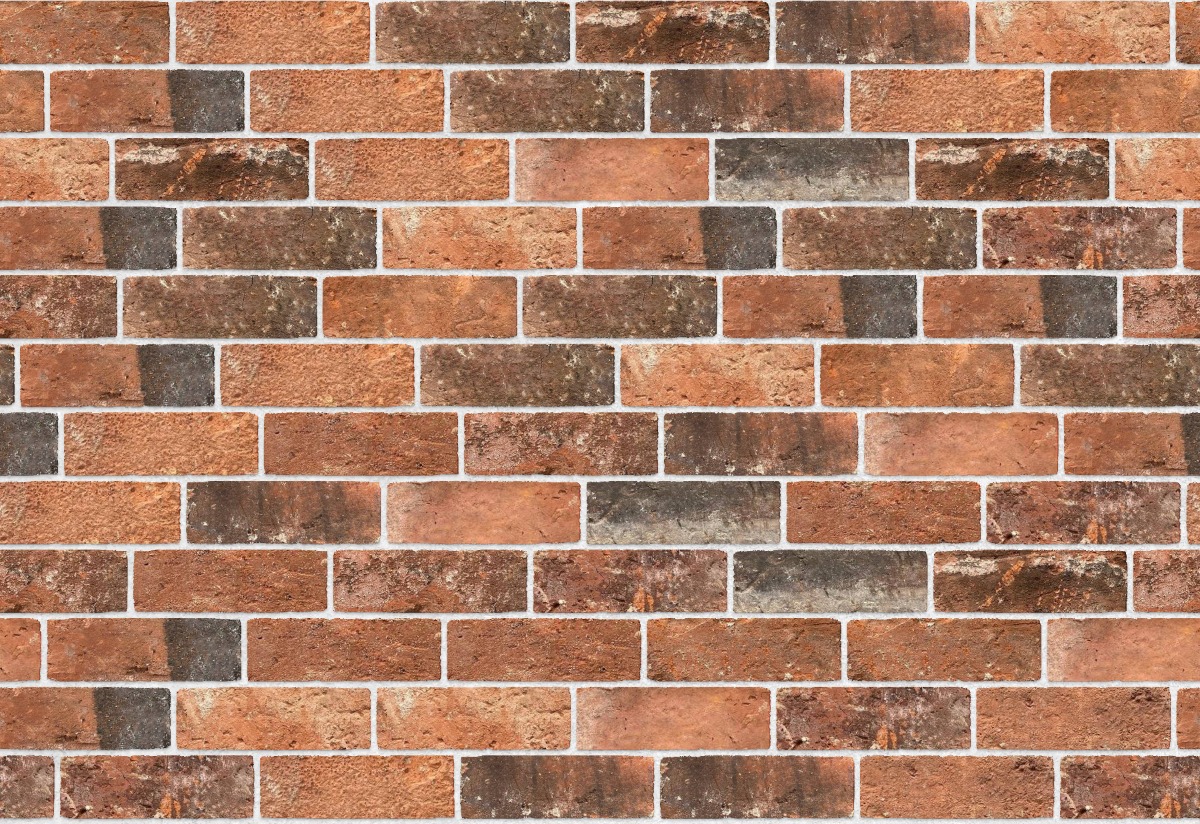 A seamless brick texture with reclaimed handmade farmhouse imperial bricks units arranged in a Staggered pattern