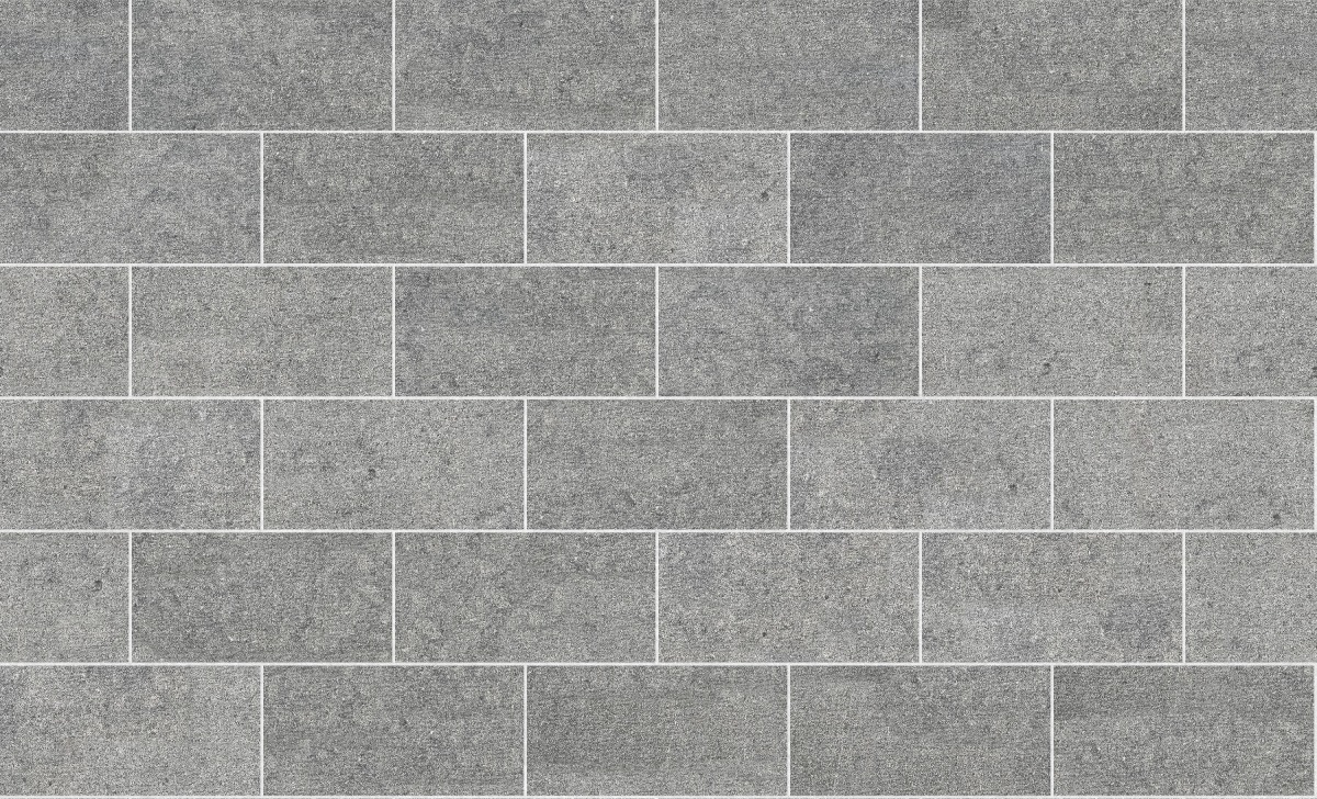 A seamless stone texture with m546 sdm499 belgian bluestone - enodesign blocks arranged in a Stretcher pattern