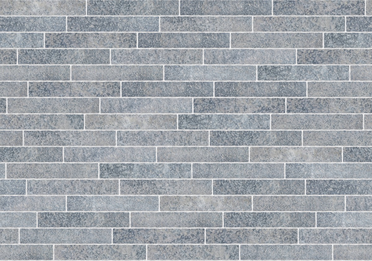 A seamless stone texture with scottish whinstone wide setts blocks arranged in a Staggered pattern