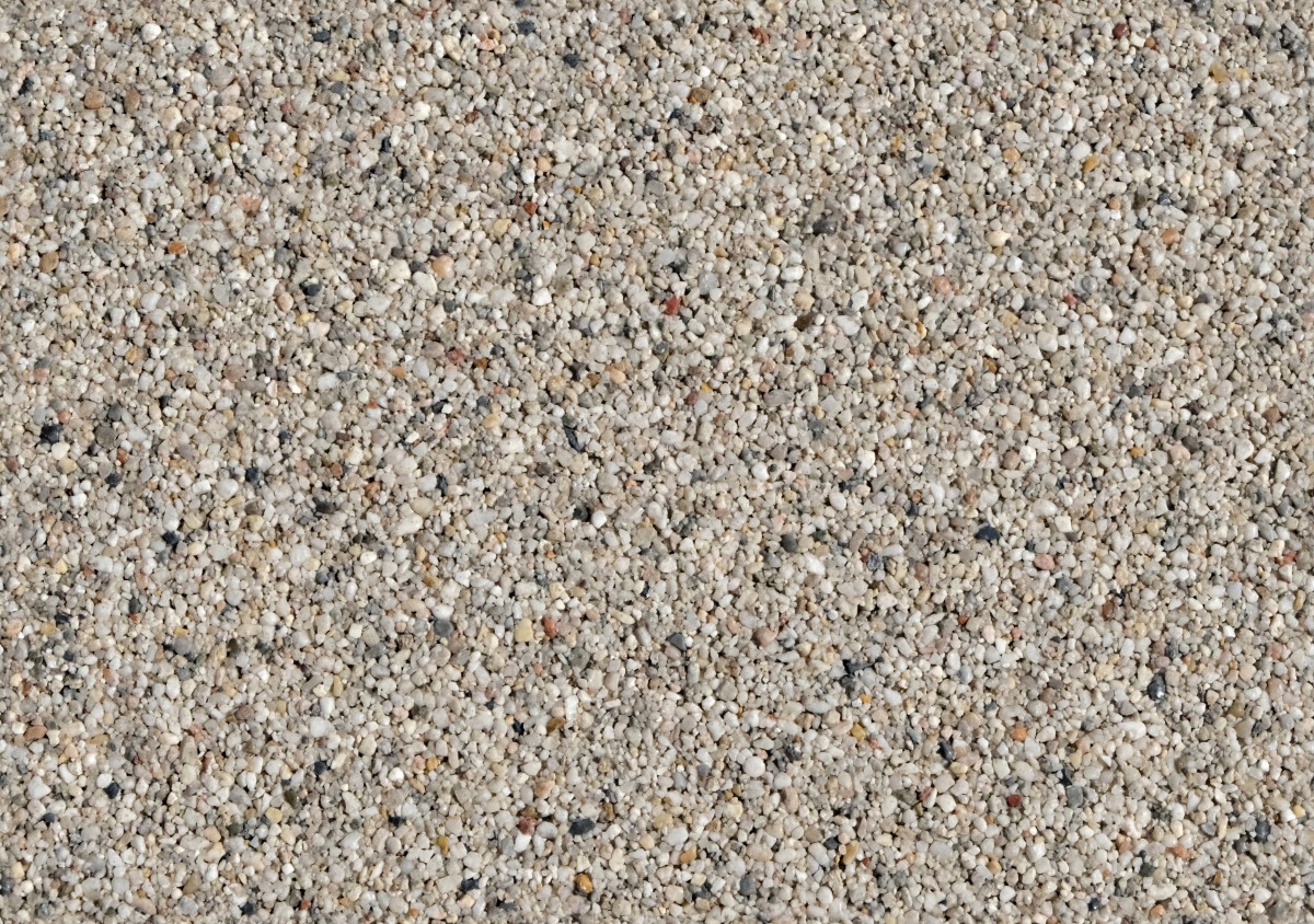 A seamless stone texture with small pebble blocks arranged in a None pattern