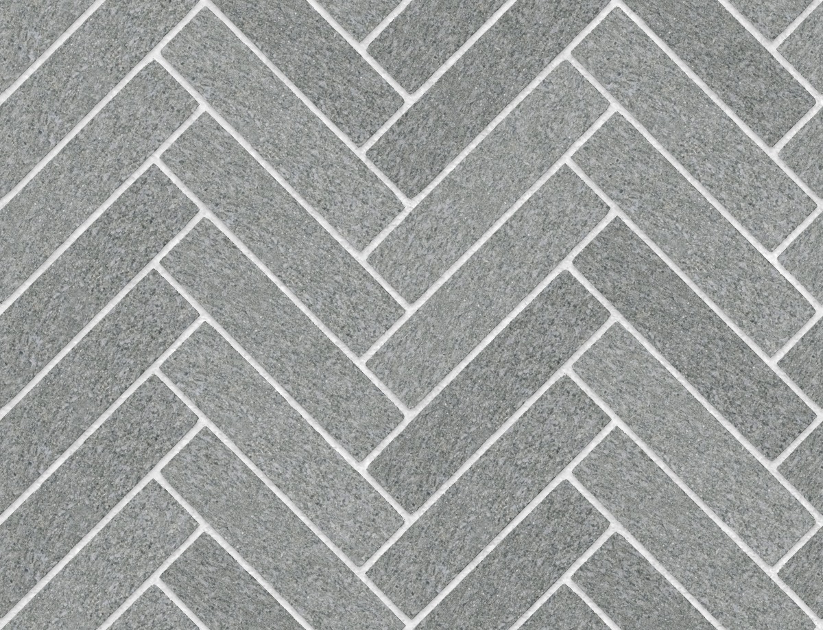 A seamless stone texture with green schist blocks arranged in a Herringbone pattern